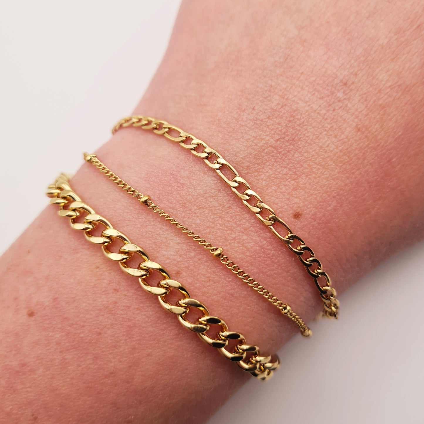 18K gold plated chain bracelet set on wrist, adjustable, waterproof, tarnish-free by Forge and Lumber.