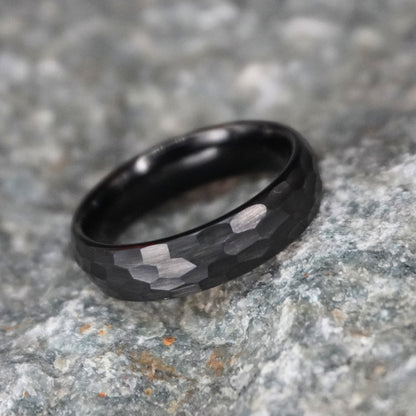 Black matte tungsten ring with hammered texture, 6mm width, by Forge and Lumber.